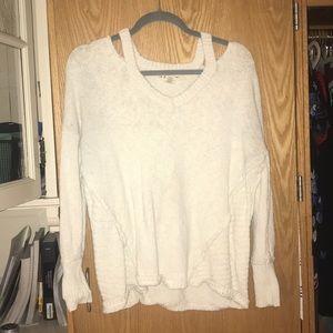 off white colored sweater with cut out shoulders